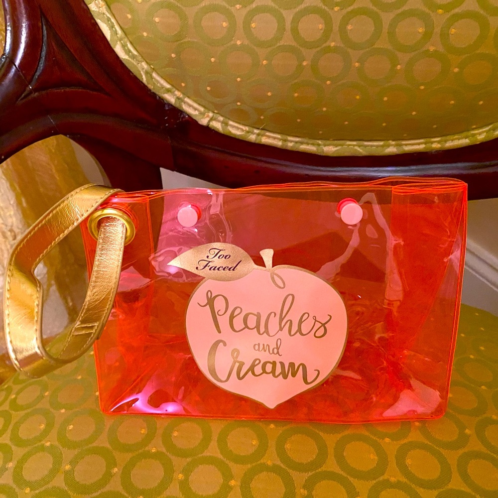 Too faced transparent cosmetic wristlet